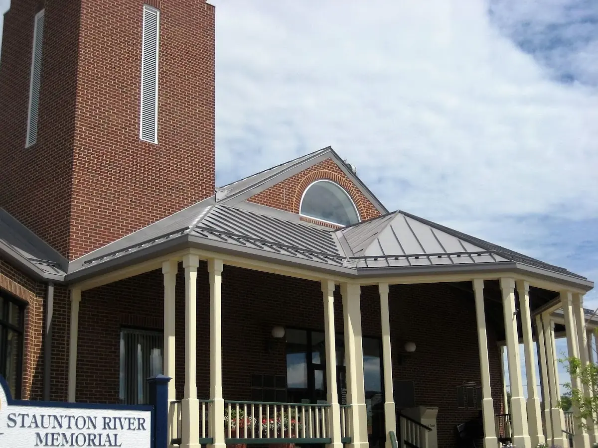Skilled roofing craftsmen working on a residential roof in Marvels Crossroads